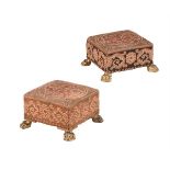 TWO SIMILAR NEEDLEWORK COVERED FOOT STOOLS INCORPORATING 19TH CENTURY AND LATER ELEMENTS