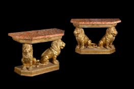 A PAIR OF CARVED GILTWOOD CONSOLE TABLES