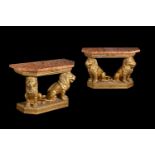 A PAIR OF CARVED GILTWOOD CONSOLE TABLES