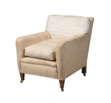 A WALNUT AND UPHOLSTERED ARMCHAIR