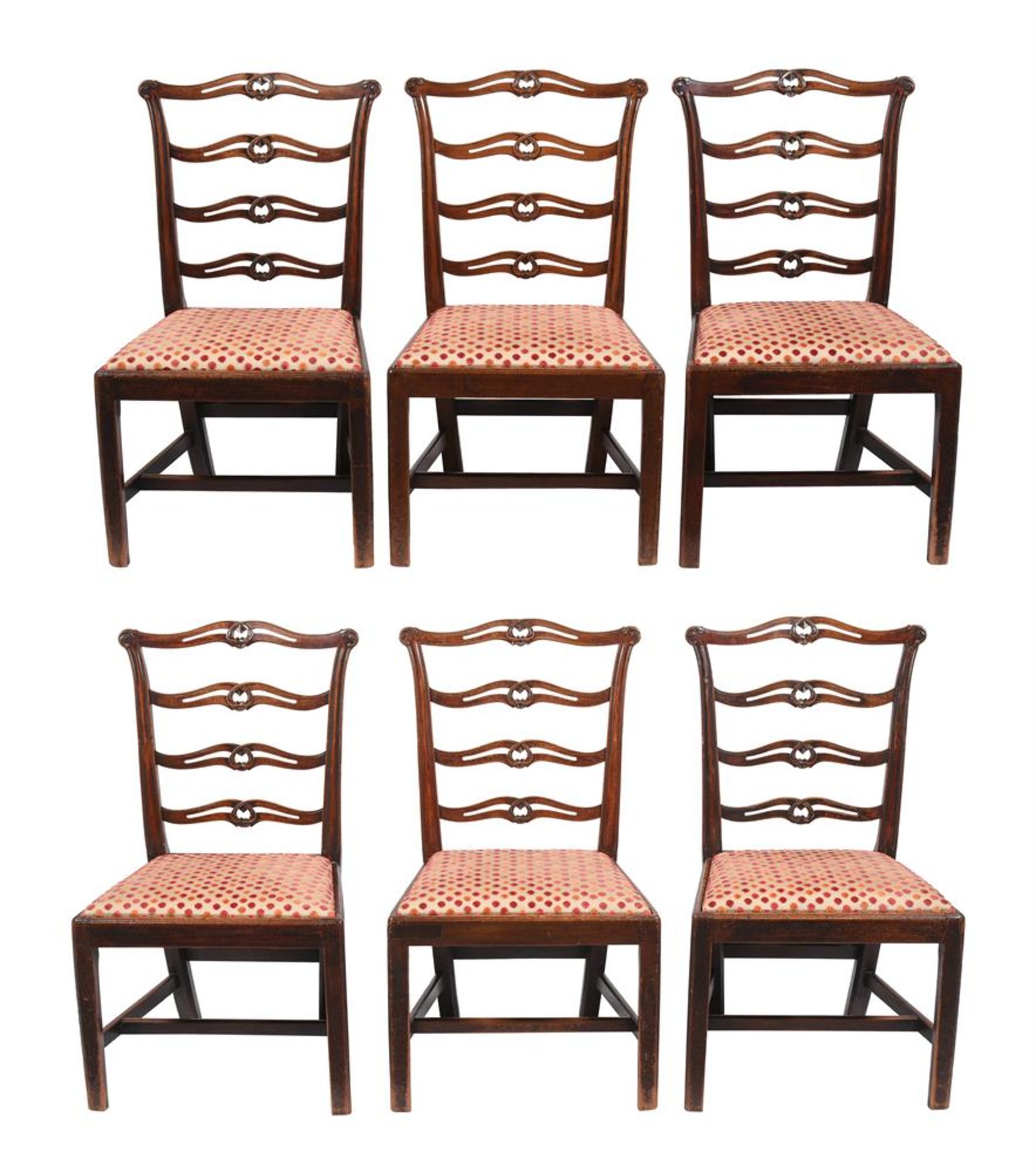 A SET OF SIX GEORGE III CARVED MAHOGANY LADDER BACK DINING CHAIRS, CIRCA 1790