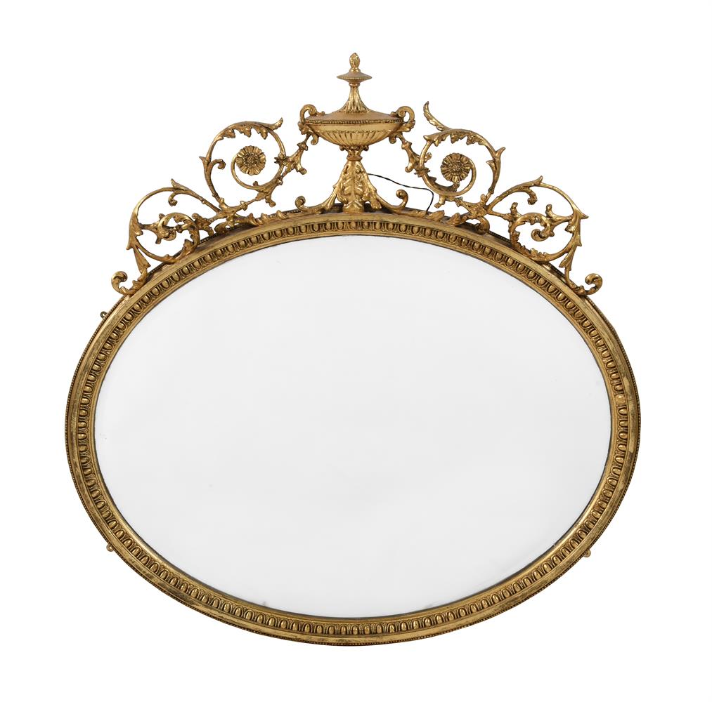 A VICTORIAN GILTWOOD WALL MIRROR IN GEORGE III 'ADAM' STYLE