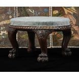 A LARGE ANGLO-INDIAN CARVED HARDWOOD AND UPHOLSTERED STOOL, MID 19TH CENTURY