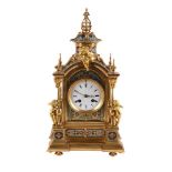 A FRENCH GILT METAL AND CHAMPLEVE ENAMEL MANTEL CLOCK, LATE 19TH CENTURY