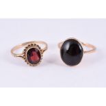 TWO GARNET RINGS