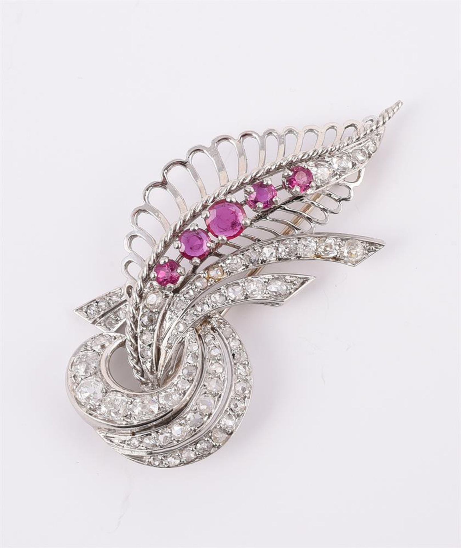 A FRENCH RUBY AND DIAMOND SCROLLING FOLIATE BROOCH MID 20TH CENTURY