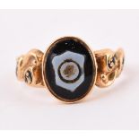 A VICTORIAN ONYX AND 18 CARAT GOLD MOURNING RING LONDON 1855