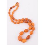 AN AMBER BEAD NECKLACE