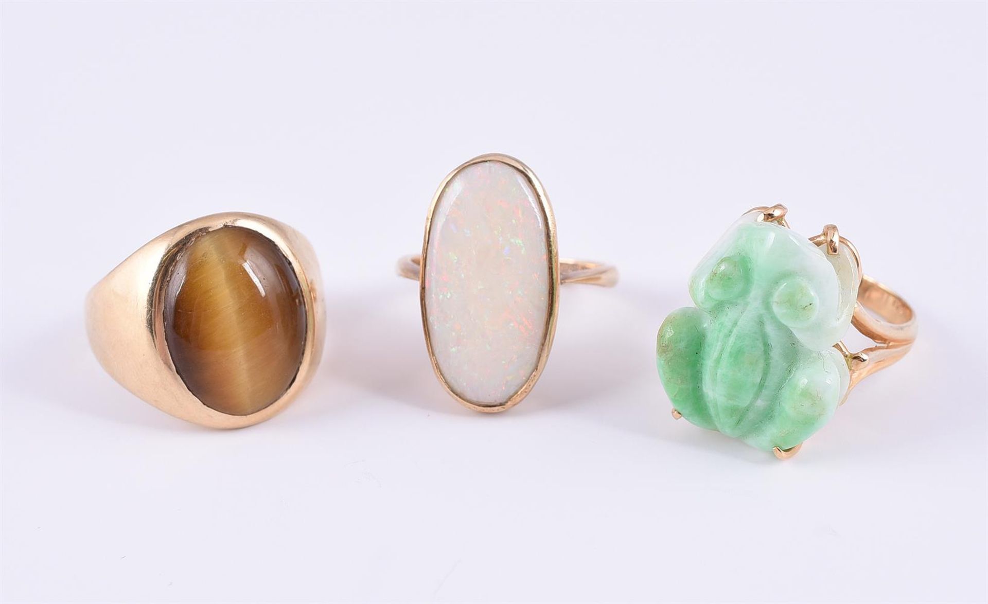 THREE GEM-SET DRESS RINGS