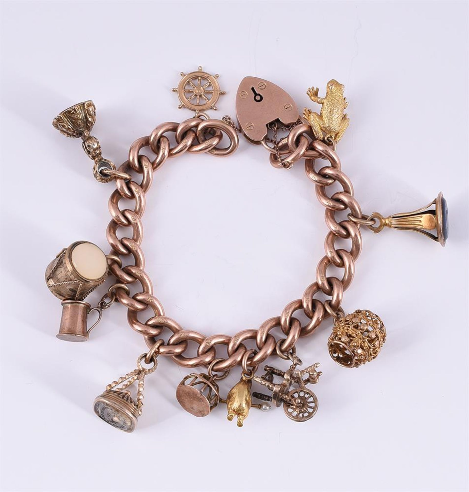 A CURB LINK CHARM BRACELET