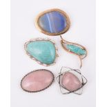 FIVE HARDSTONE BROOCHES