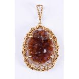 ALICK DOWNING, AN 18CT GOLD GEODE PENDANT