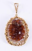 ALICK DOWNING, AN 18CT GOLD GEODE PENDANT