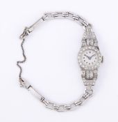 UNSIGNED, A LADY'S PRECIOUS WHITE METAL AND DIAMOND COCKTAIL WATCH