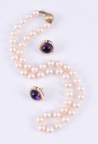A PAIR OF AMETHYST EARRINGS AND A CULTURED PEARL NECKLACE