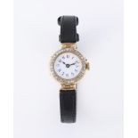 UNSIGNED, A LADY'S 18 CARAT GOLD AND DIAMOND WRIST WATCH