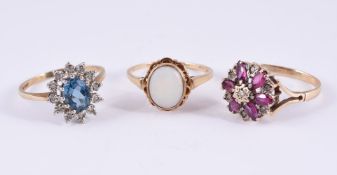 A COLLECTION OF THREE DRESS RINGS