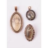 TWO ANTIQUE LOCKET PENDANTS AND A BROOCH