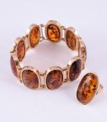 J. B. SORENSEN, A HEATED AMBER BRACELET AND RING