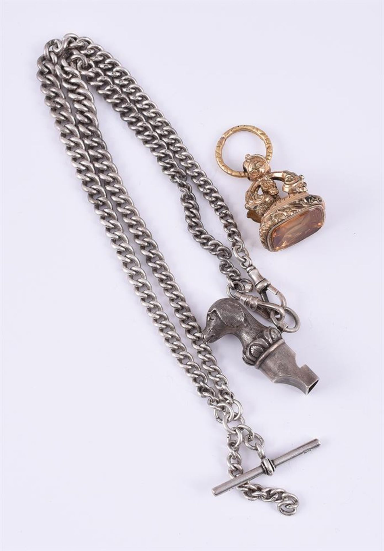 A DOG WHISTLE, SILVER CHAIN AND A GILT CITRINE FOB