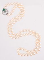 A CULTURED PEARL NECKLACE WITH WHITE AND GREEN STONE CLASP