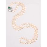 A CULTURED PEARL NECKLACE WITH WHITE AND GREEN STONE CLASP