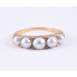 A HALF PEARL AND DIAMOND RING