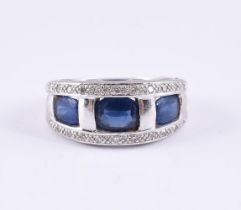 A SAPPHIRE AND DIAMOND DRESS RING