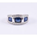 A SAPPHIRE AND DIAMOND DRESS RING