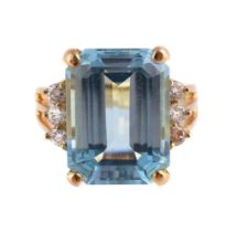 A BLUE TOPAZ AND DIAMOND RING