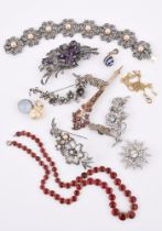 A COLLECTION OF PASTE SET JEWELLERY