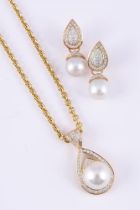 A CULTURED PEARL PENDANT NECKLACE AND EARRINGS