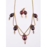 A 19TH CENTURY AND LATER GARNET FRINGE NECKLACE AND EARRINGS