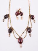 A 19TH CENTURY AND LATER GARNET FRINGE NECKLACE AND EARRINGS