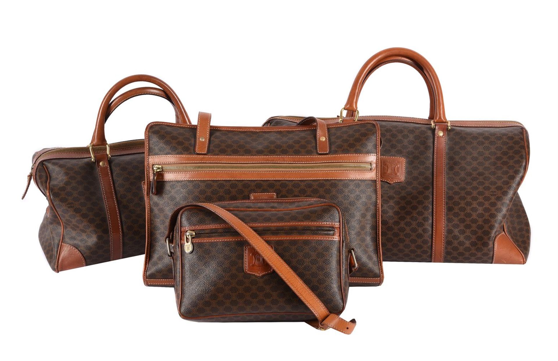 CELINE, A COATED CANVAS FOUR PIECE TRAVELLING LUGGAGE SET