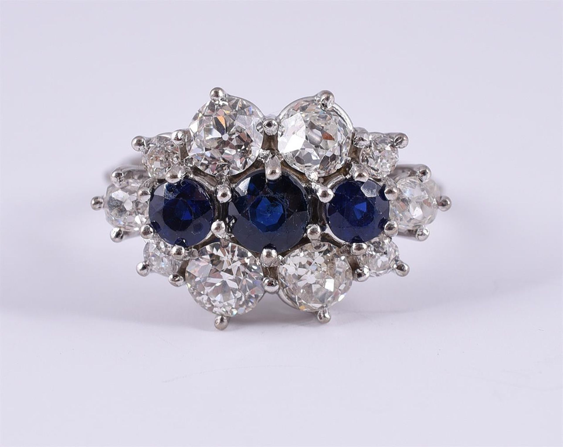 A SAPPHIRE AND DIAMOND DRESS RING