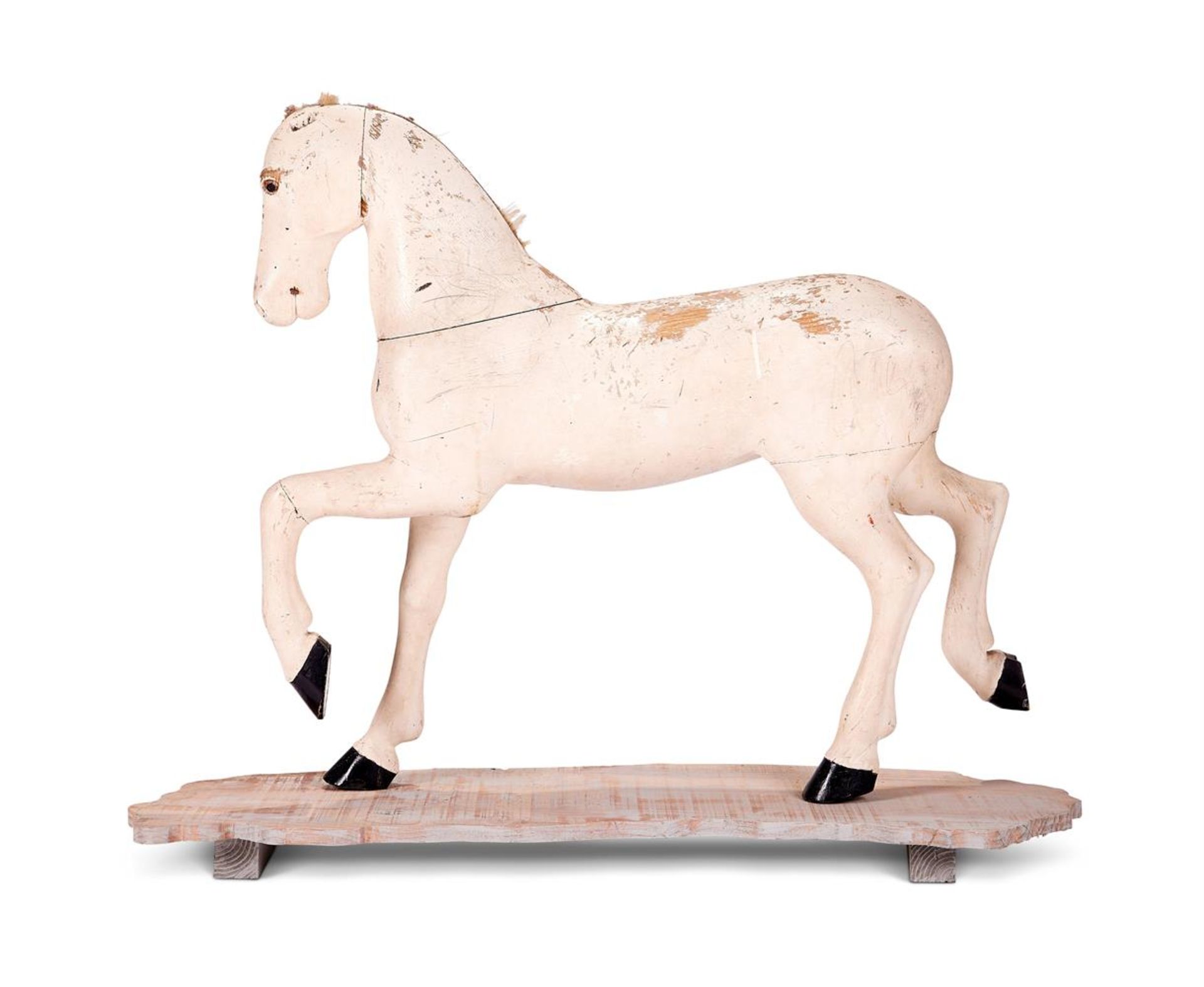 A SWEDISH CARVED AND PAINTED PINE MODEL OF A HORSE, LATE 19TH CENTURY