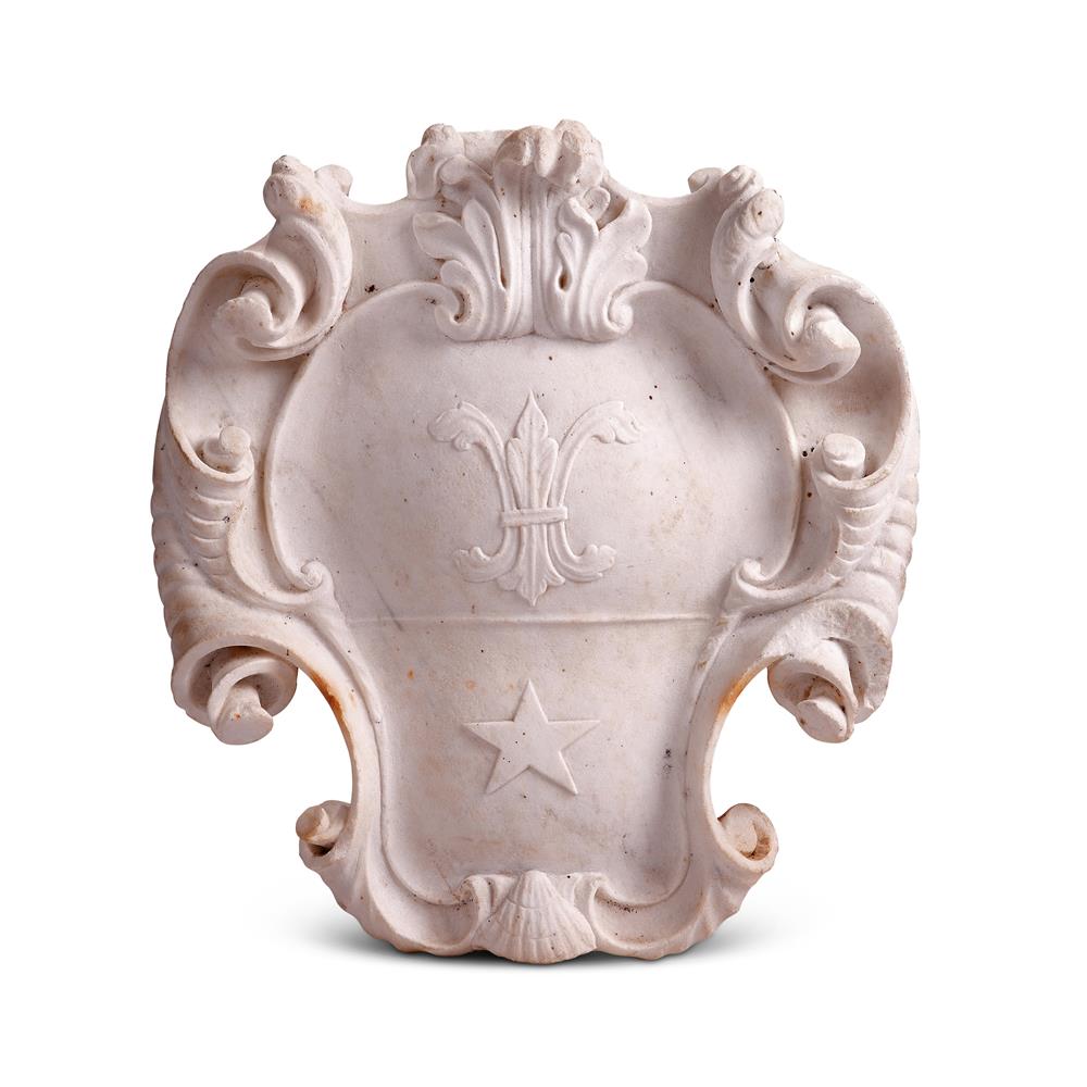 A CARVED WHITE MARBLE CARTOUCHE OR SHIELD, POSSIBLY FRENCH, MID 18TH CENTURY