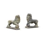 AFTER THE ANTIQUE A PAIR OF COMPOSITION STONE MEDICI LIONS, MODERN