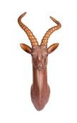 λ A COPPER WALL MOUNTED MODEL OF AN ANTELOPE HEAD BY SERGIO BUSTAMANTE, CIRCA 1975