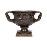 AFTER THE ANTIQUE, AN IMPRESSIVE PATINATED CAST IRON WARWICK VASE, MID 19TH CENTURY