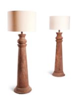 A LARGE PAIR OF INDIAN TURNED HARDWOOD COLUMNAR LAMPS, 19TH OR 20TH CENTURY