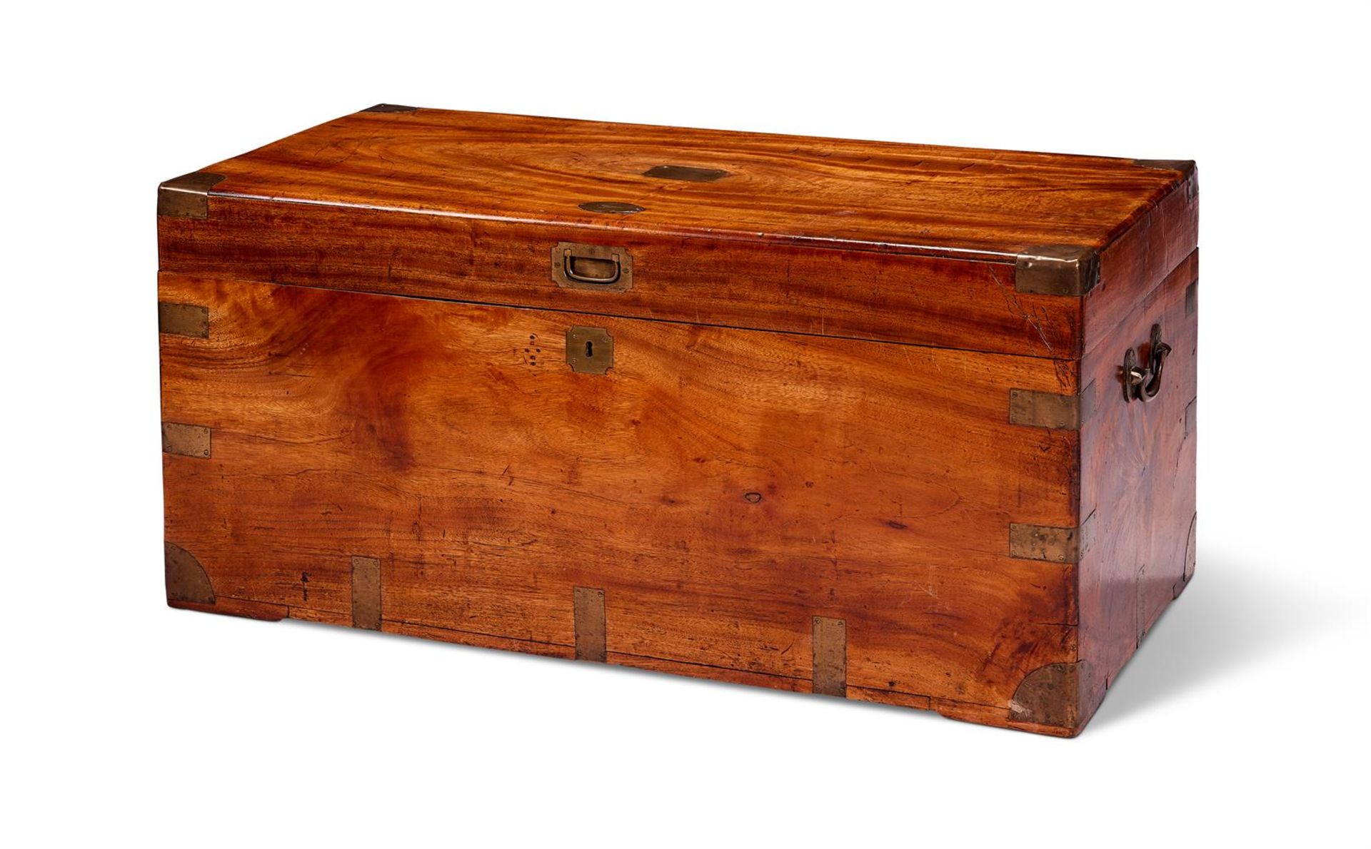 A VICTORIAN CAMPHOR WOOD AND BRASS BOUND CAMPAIGN TRUNK, MID 19TH CENTURY