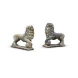AFTER THE ANTIQUE A PAIR OF COMPOSITION STONE MEDICI LIONS, 20TH CENTURY