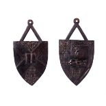 A PAIR OF VICTORIAN CARVED WALNUT SHIELD WALL PLAQUES SCOTTISH, THIRD QUARTER 19TH CENTURY