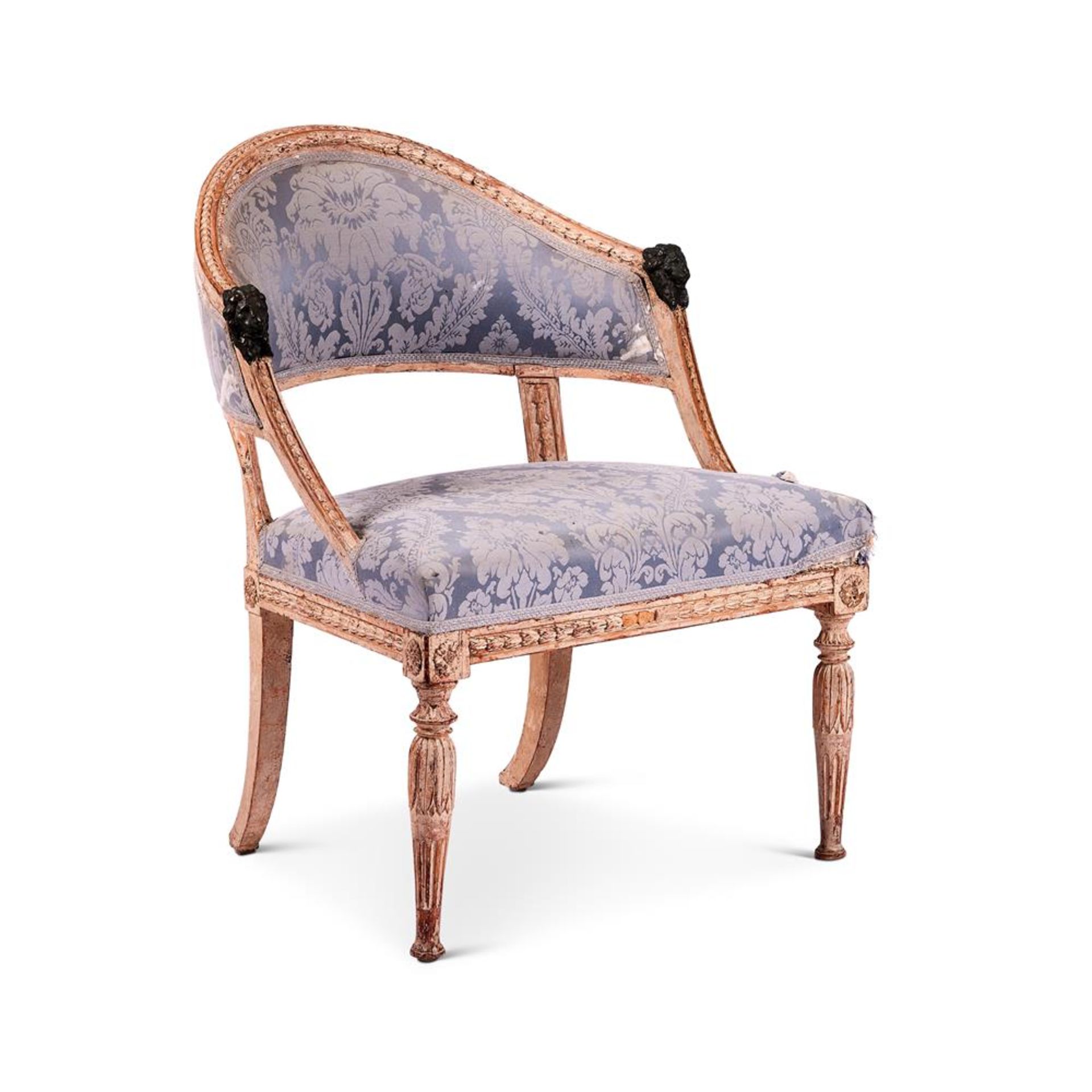 A SWEDISH EMPIRE CARVED, CREAM PAINTED AND DAMASK UPHOLSTERED ARMCHAIR, EARLY 19TH CENTURY