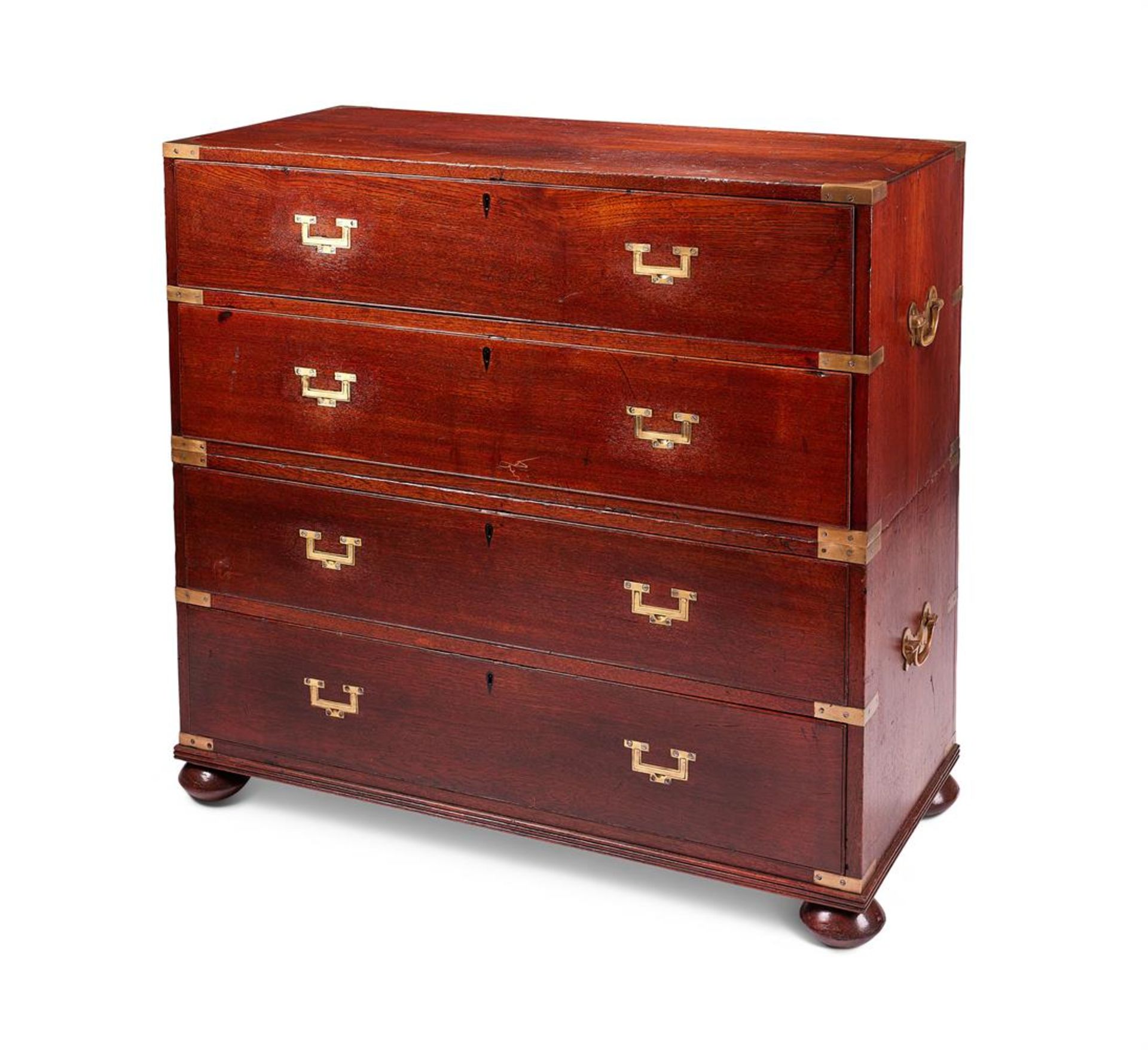 AN EARLY VICTORIAN TEAK AND BRASS MOUNTED CAMPAIGN CHEST OF DRAWERS, MID 19TH CENTURY