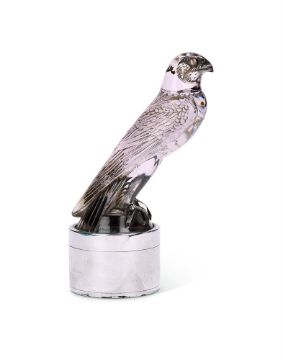 AN ART DECO MAUVE TINTED GLASS FALCON CAR MASCOT BY RENÉ LALIQUE, CIRCA 1925