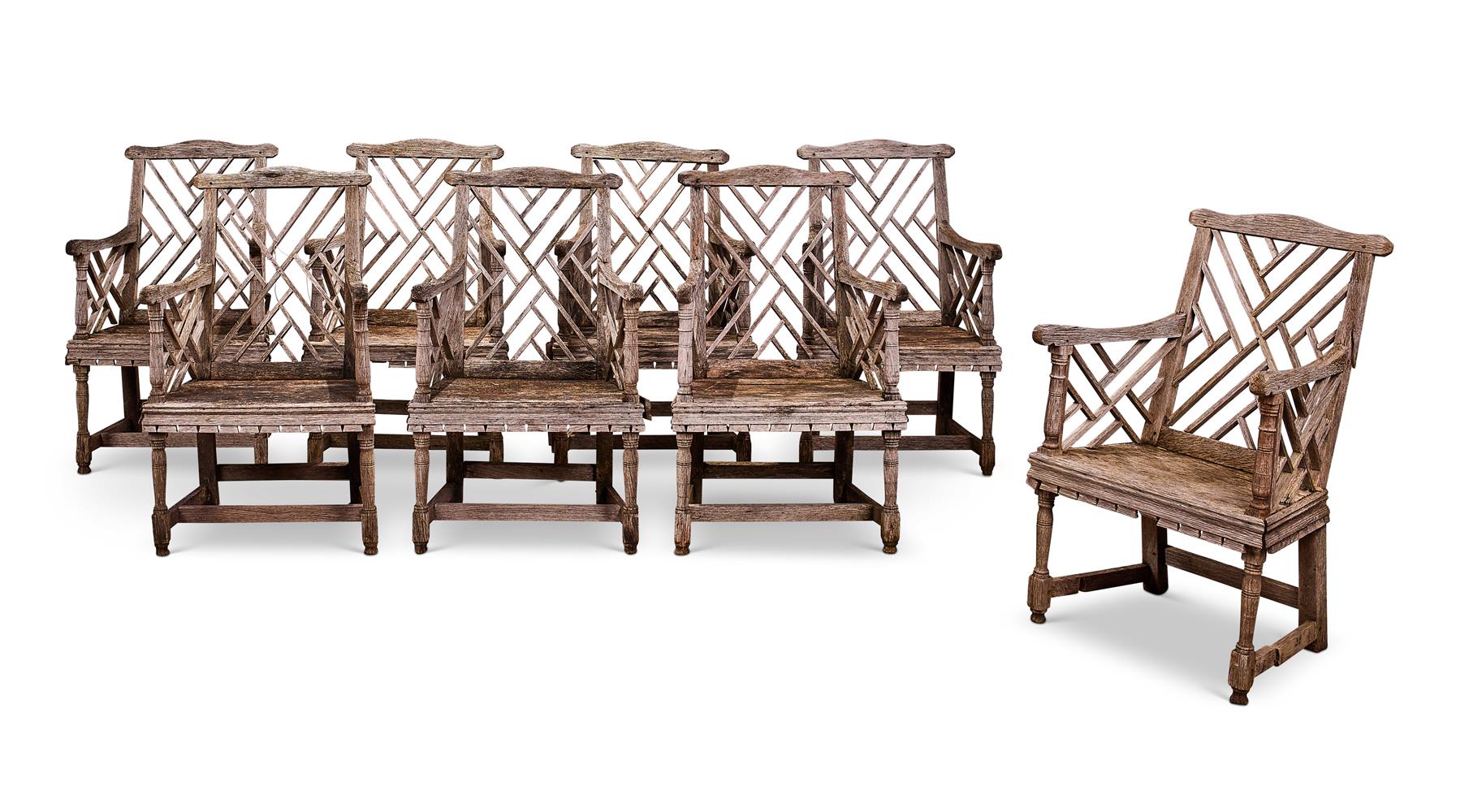 A SET OF EIGHT HARDWOOD 'COCKPEN' OPEN ARMCHAIRS IN GEORGE III STYLE