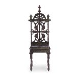 ATTRIBUTED TO CHRISTOPHER DRESSER FOR COALBROOKDALE, A PATINATED CAST IRON HALL CHAIR, LATE 19TH C